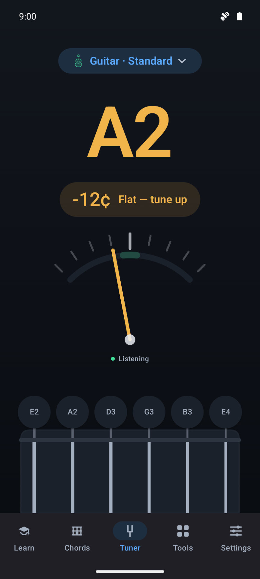 The TuneHaven tuner reading A2 at minus 12 cents, labelled “Flat — tune up”.